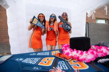 cheerleaders at a tailgate party